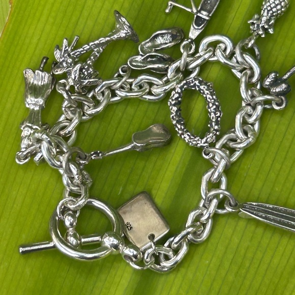 Vintage sterling Silver Hawaiian Charms link Bracelet 7.25. 44plus grams